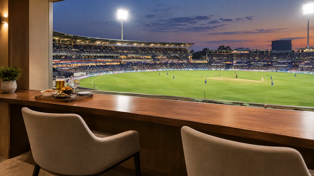 Clearly labelled conceptual cricket stadium hospitality viewing area, not an actual M. Chinnaswamy Stadium lounge