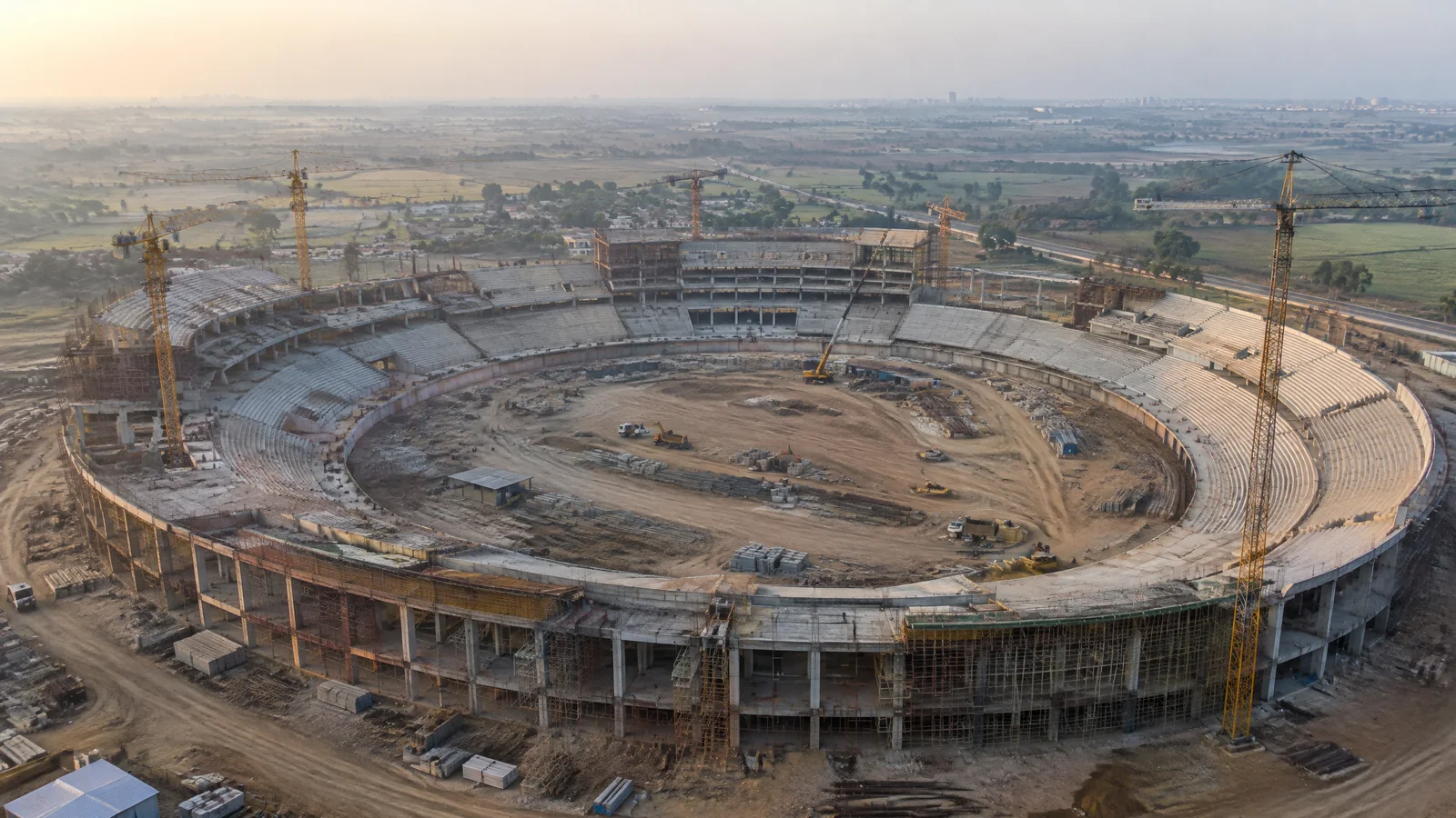 Text-free editorial view of Ekana Cricket Stadium under construction in Lucknow