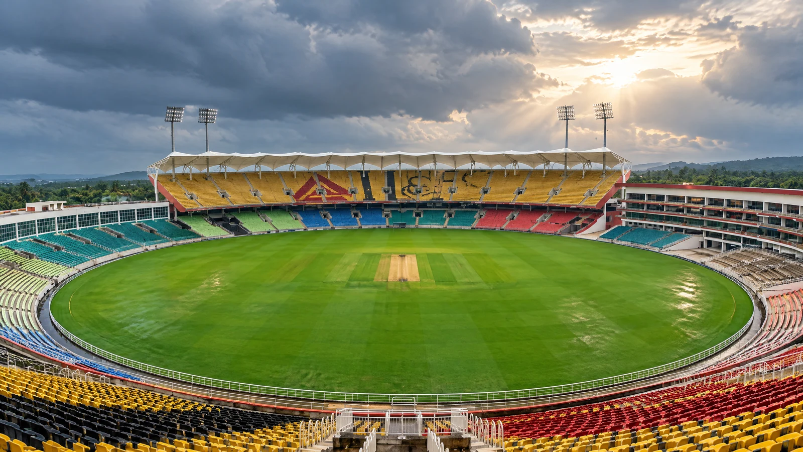 Greenfield Stadium in Kerala under tropical monsoon clouds